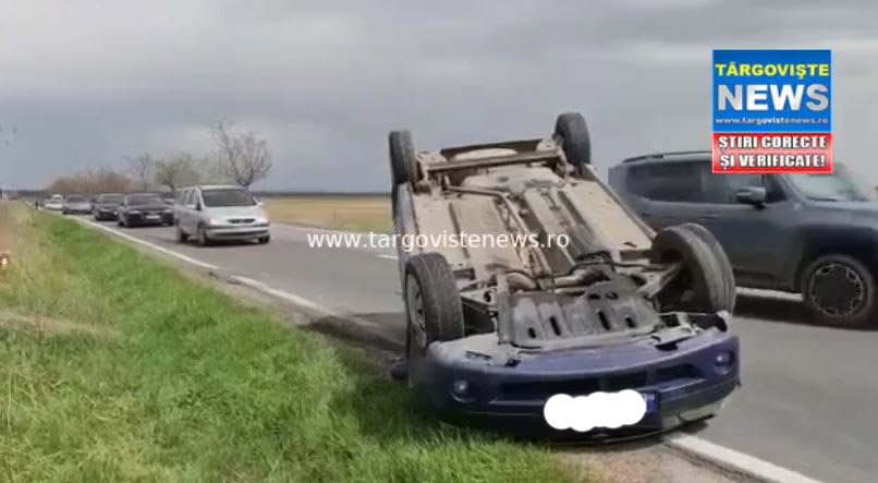 FOTO/VIDEO: Depăşire imprudentă, pe DN 71, lângă Nucet. O maşină s-a răsturnat, iar şoferul a fost rănit